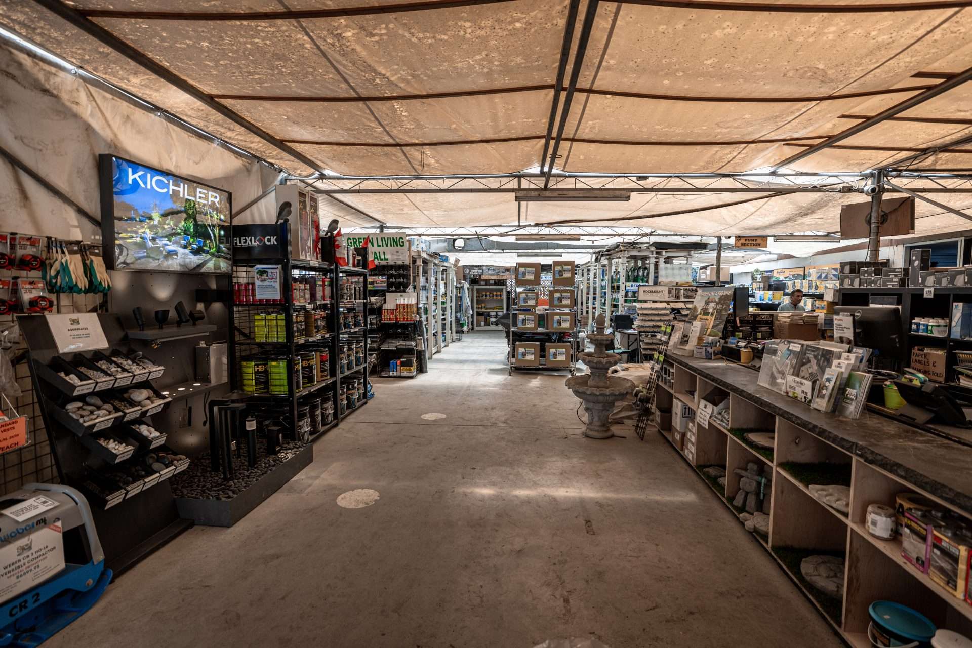 The inside of the store Sid's Ponds. It displays pond supplies from pond de-icers to pond nets, pond filters, and more!